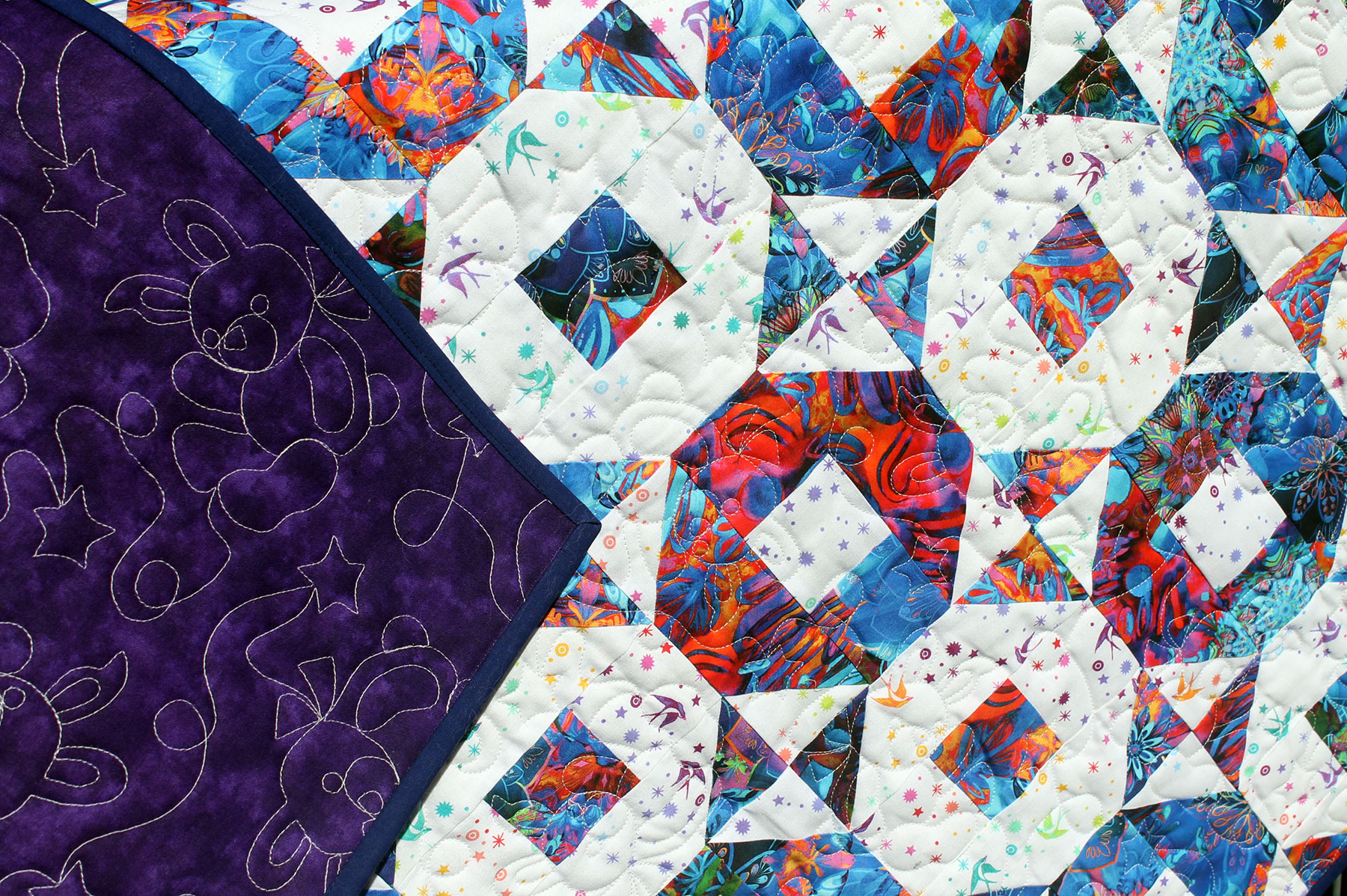 Batik Alternating Ring Toss Baby Quilt Closeup