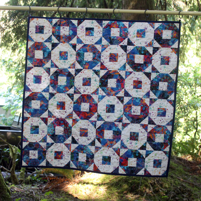 Batik Alternating Ring Toss Baby Quilt Front